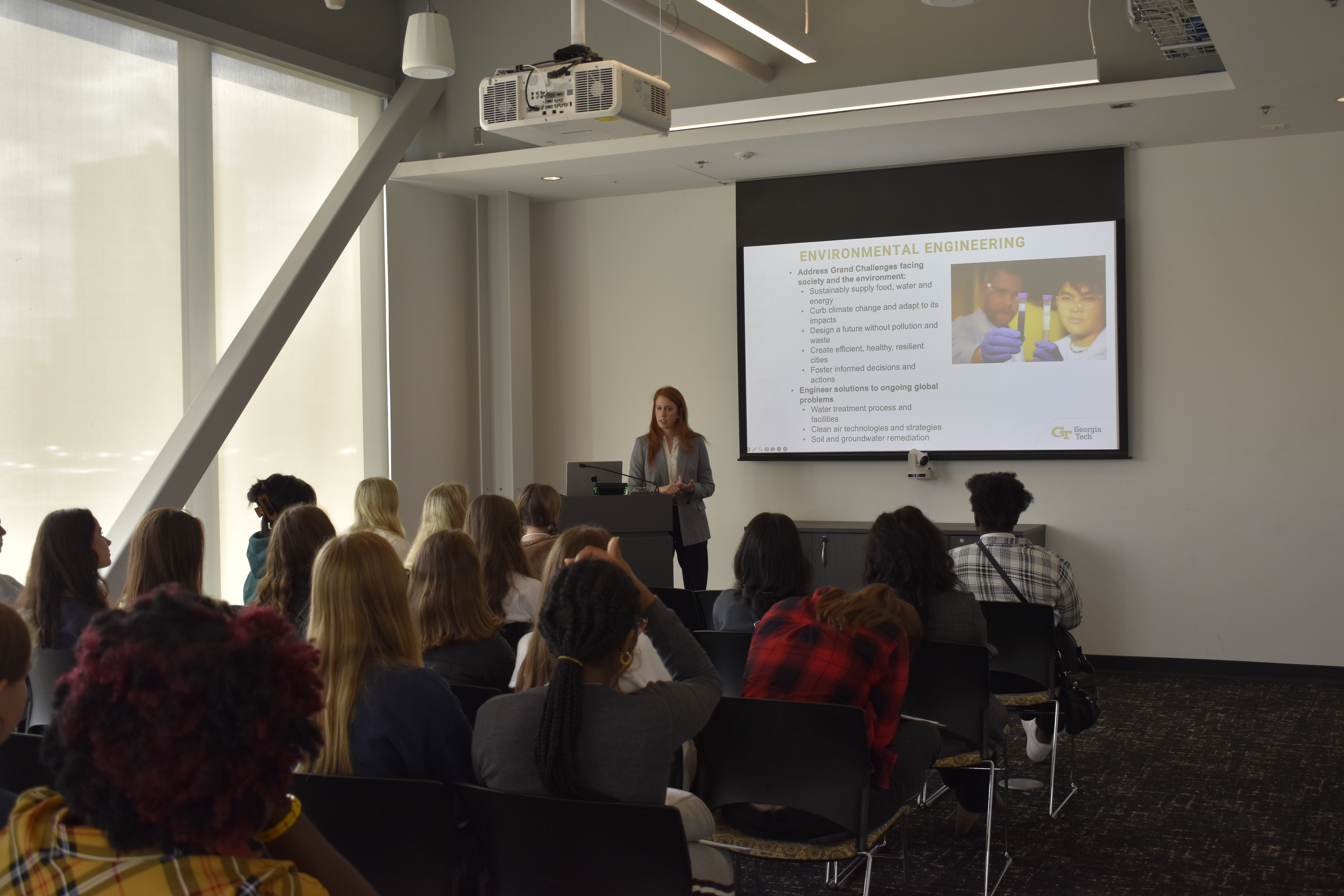 Associate Professor Lauren Stewart talks with high school juniors about the School of Civil and Environmental Engineering at the 2023 Engineering Career Conference organized by Women in Engineering.
